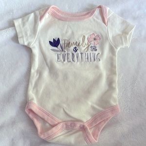 Used crème onesie. 0-3months